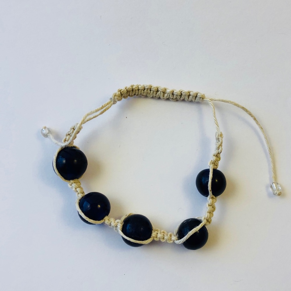 Cream cord and blue bead shambala bracelet